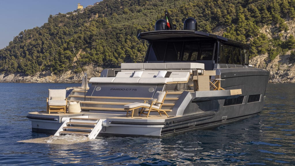 Rear view of boat featuring steps into water