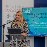 A woman speaks at a podium during SIBS 2024 Trade Tuesday (3)