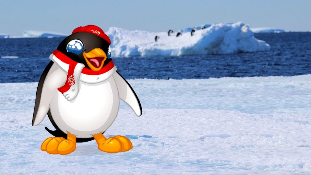 cartoon penguin superimposed onto block of ice