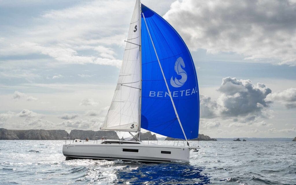Bright blue sail on Beneteau