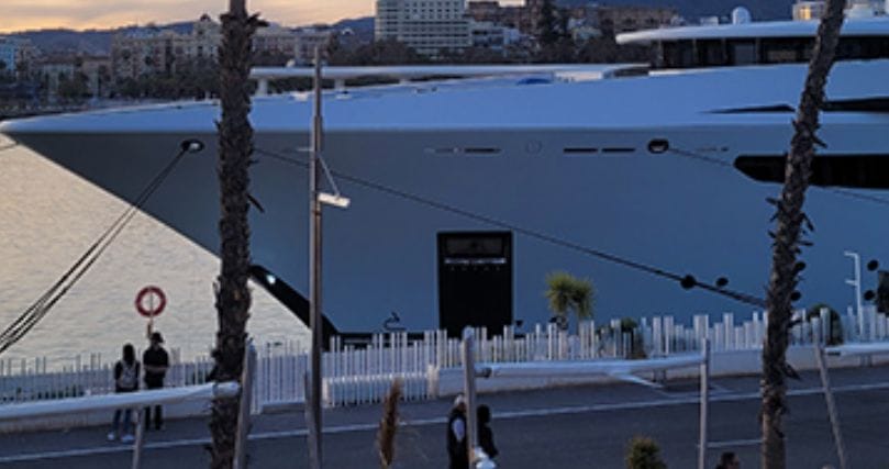 detail of existing white fence in front of a superyacht at Malaga Marins