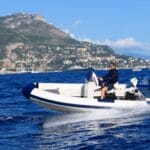 ExploMar electric outboard on boat in Italy