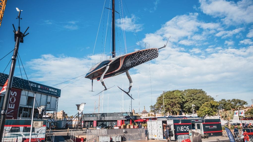 INEOS Britannia being craned in for America's Cup racing