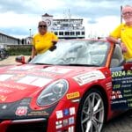 Belinda and James Richardson visited all 238 RNLI lifeboat stations in their Porsche 911 Credit RNLI
