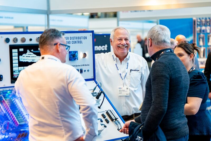 man showcasing product on a stand at METSTRADE 2024