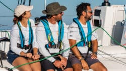 Three sailors with lifejackets on