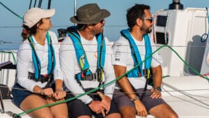 Three sailors with lifejackets on