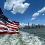 USA flag on back of boat underway