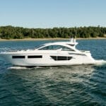 large white flybridge motorboat