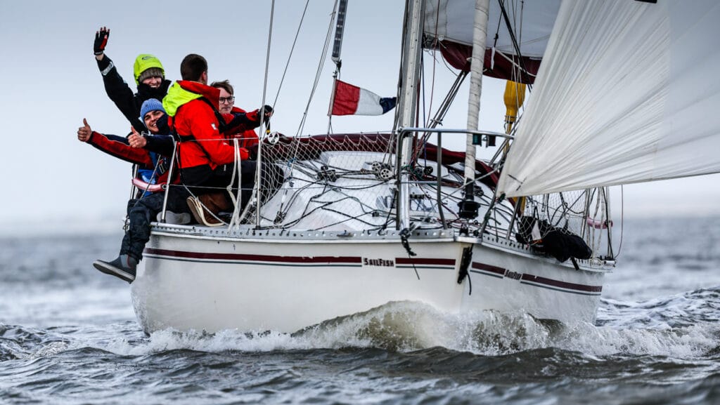 Sailors aboard yacht