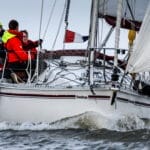 Sailors aboard yacht