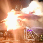 Sanlorenzo yacht on fire in dry dock - flames engulf vessel in Puerto Sotogrande