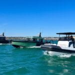 Three luxury utilitarian leisure boats line-up on the water in Jersey. Arksen 8 Arksen 30 Arksen 28 in Jersey