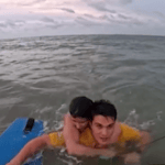 Bruno Lobo rescues woman on his kiteboard.
