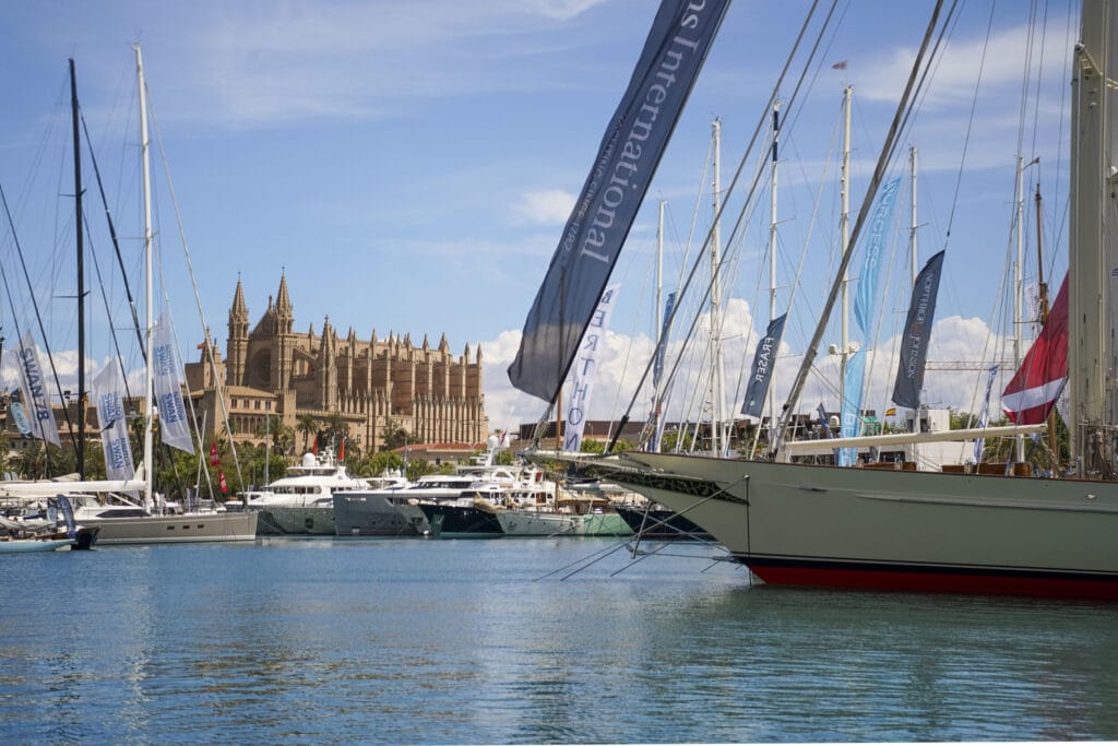 Luxury yacht bow in Palma Harbour with Palma cathedral in background