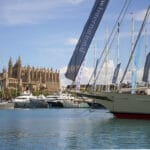 Luxury yacht bow in Palma Harbour with Palma cathedral in background