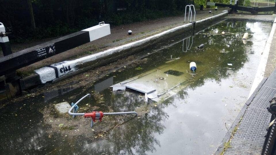 submerged canal boat after being caught on a lock cill - River and Canal Rescue helped with the incident